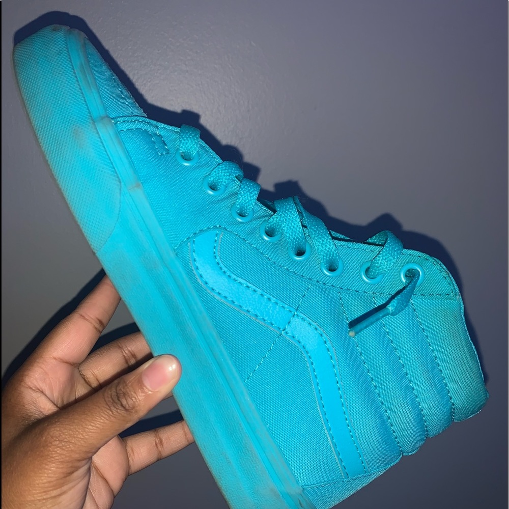 Turquoise high top Vans